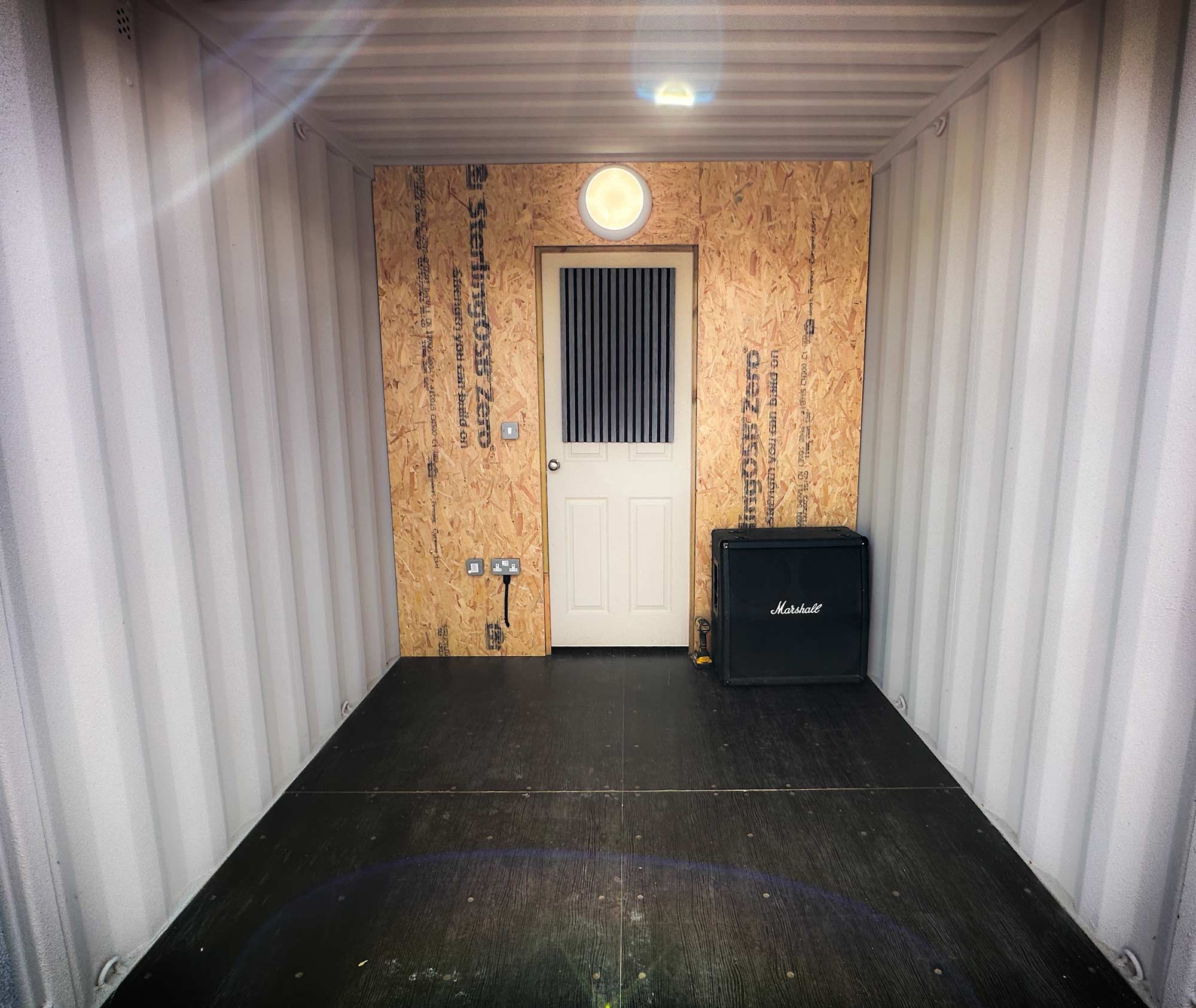 Sealed and moisture-treated dry storage container interior